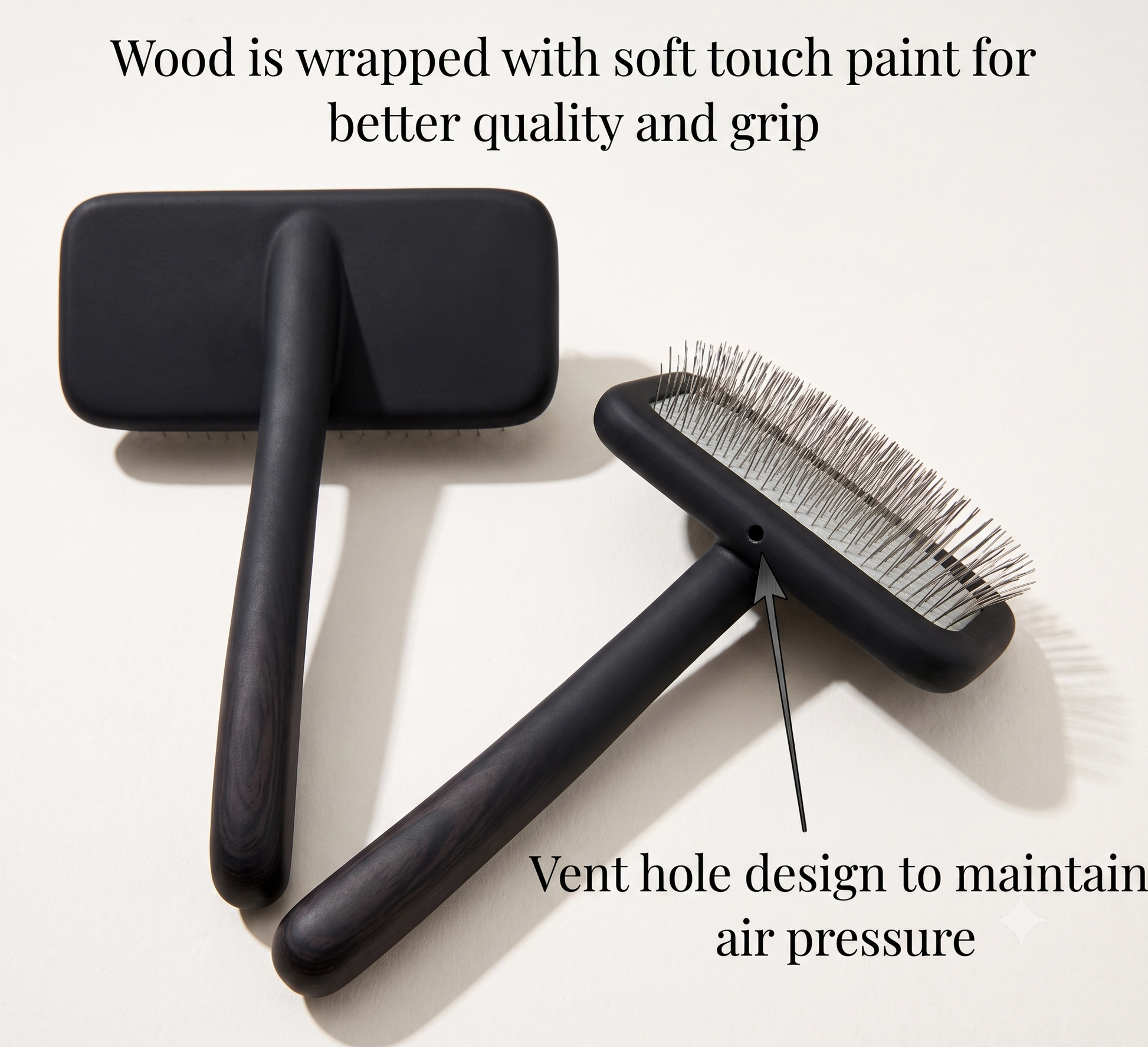 Two black pet grooming brushes on a light beige background with explanatory text overlays highlighting the wood wrap, grip, and vent hole design.
