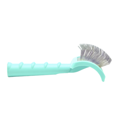 A mint green plastic pet grooming brush with metal bristles, shown against a plain white background.
